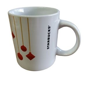 Starbucks Coffee mug. 10.8 fl. oz. White with red hanging ornaments.